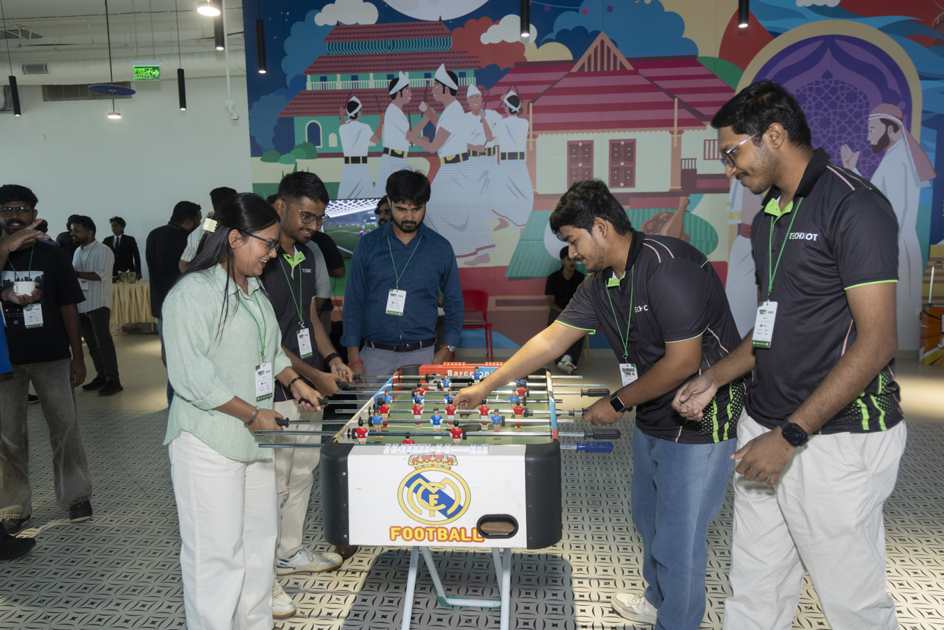 People playing table top football